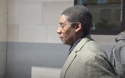 Art dealer Oghenochuko Ojiri leaves the Westminster Magistrates' Court in London after a hearing in the case accusing him of violating the UK Terrorism Act by selling artwork to an alleged Hezbollah financer, May 9, 2025. (Screen capture: Youtube/City News)